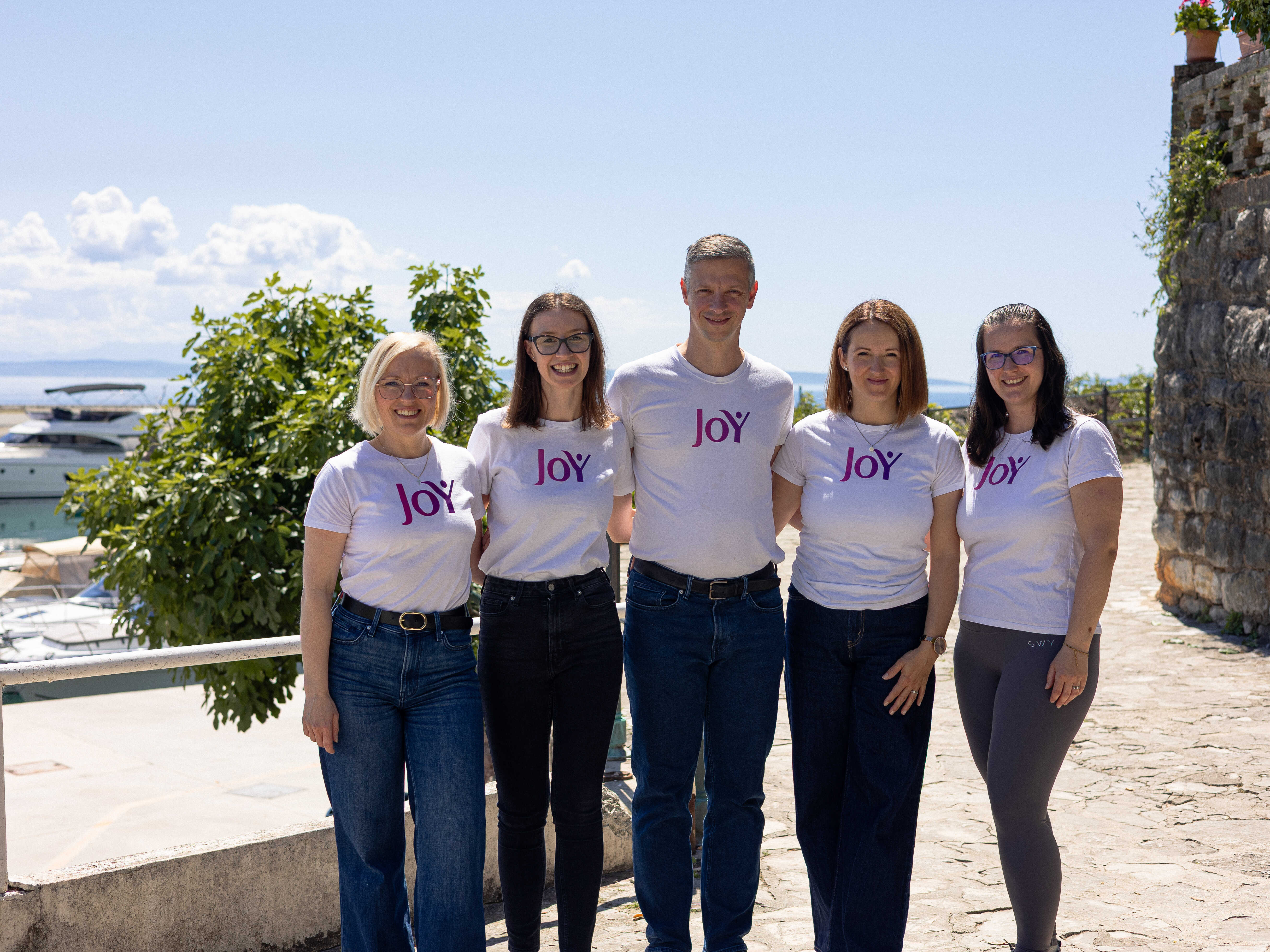 JOY Coaching community on the stairs